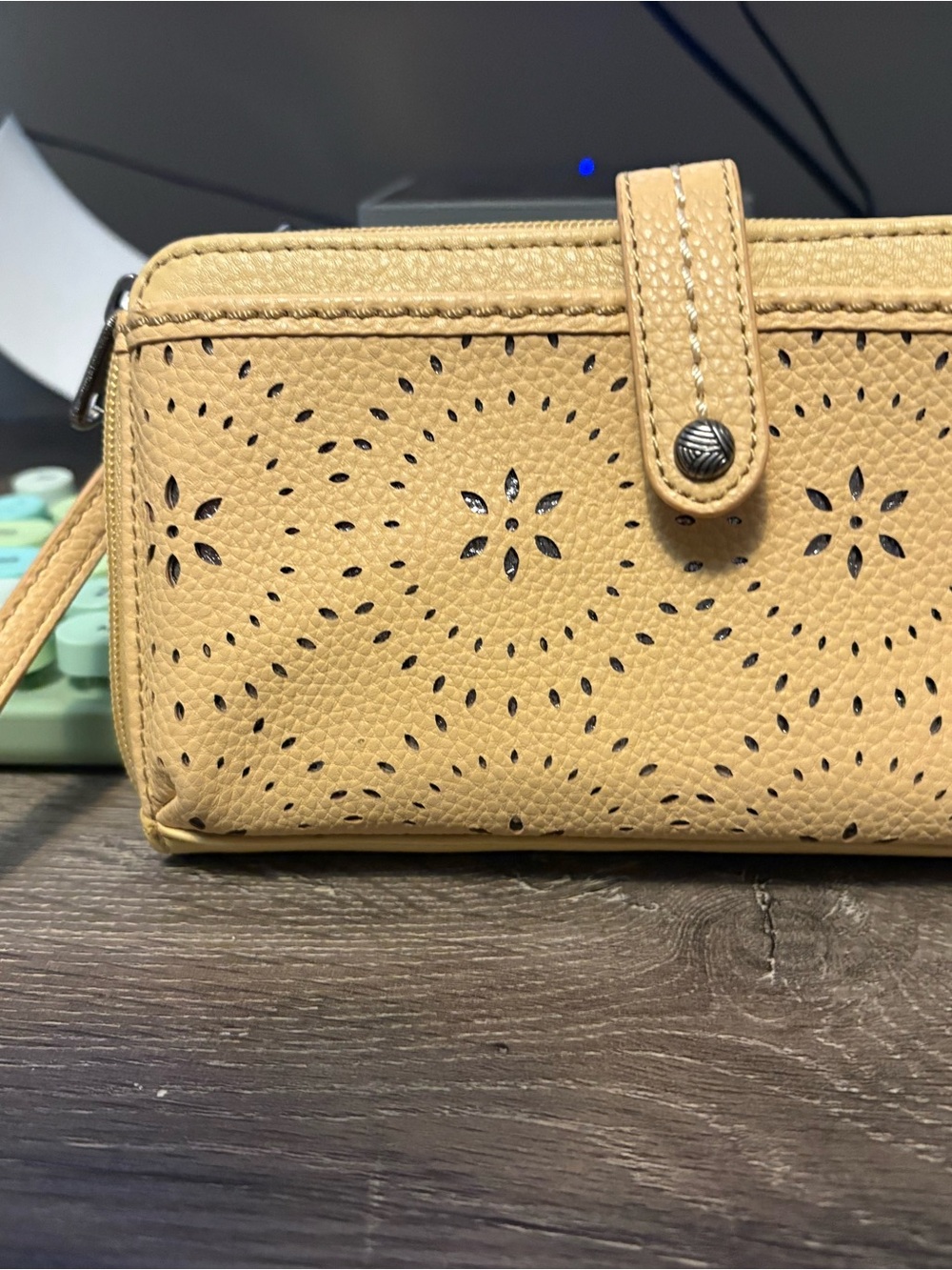 The Sak Perforated Wristlet crossbody in Tan